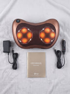 Almohada masajeadora Nido con su adaptador de corriente y manual