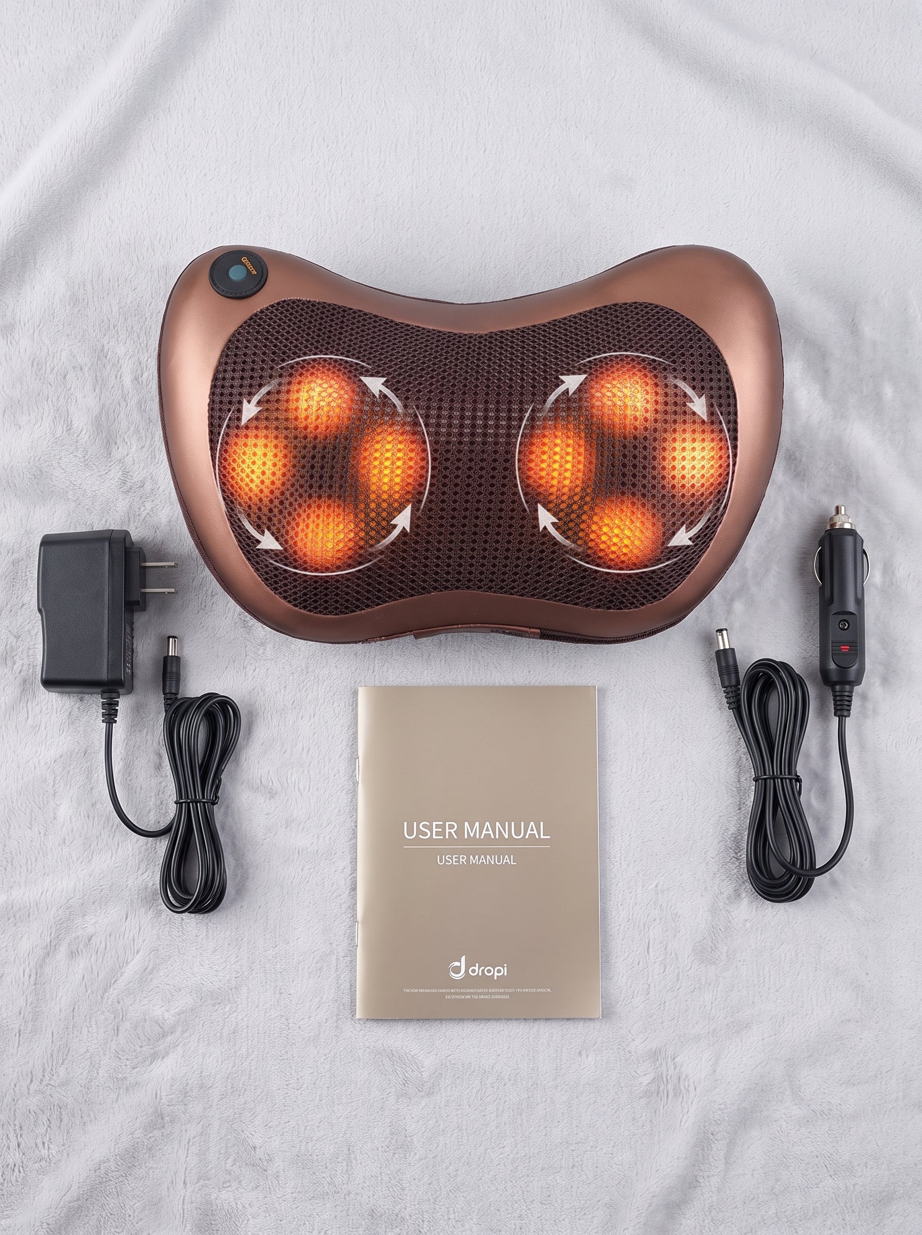 Almohada masajeadora Nido con su adaptador de corriente y manual