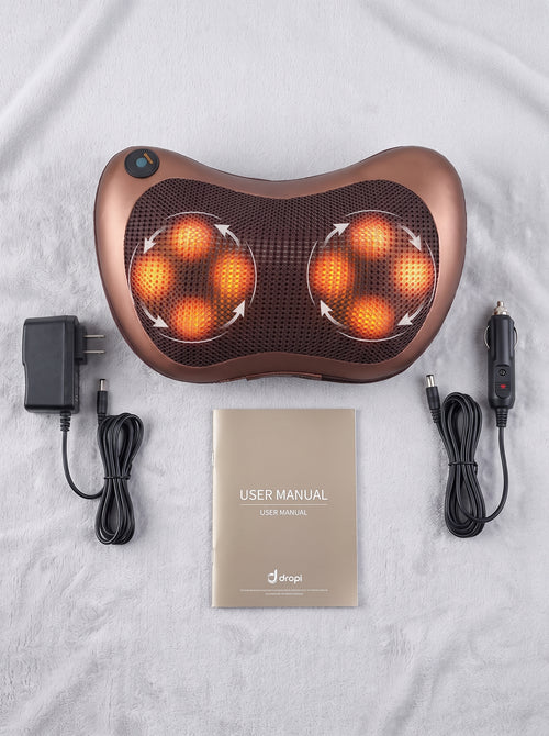 Almohada masajeadora Nido con su adaptador de corriente y manual