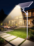 Foco solar LED 200W Nido iluminando un exterior de noche